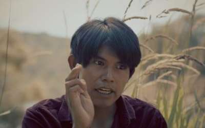 A still of Joshua Dixon, a member of the Navajo Nation, from the film ‘The Illusion of Abundance,’ where he explains the connection many Native people have with the land. 
