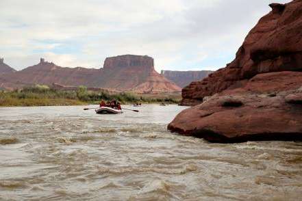 Journalists and water experts raft down the Moab Daily section of the Colorado River with Holiday River Expeditions during a kickoff event for the Colorado River Collaborative in Grand County on Thursday, April 25, 2024.