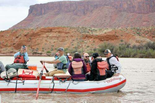 Tim Gaylord, Holiday River Expeditions director of operations, takes journalists and water experts down the Colorado River Moab Daily during a kickoff event for the Colorado River Collaborative in Grand County on Thursday, April 25, 2024. The kickoff event was sponsored by the Utah State University Janet Quinney Lawson Institute for Land, Water and Air and The Water Desk. (Kristin Murphy, Deseret News)