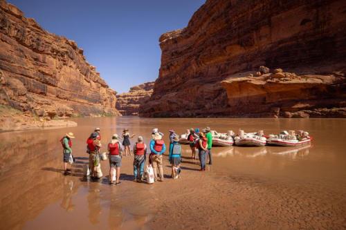 A group of rafters is briefed before running the San Juan River, a tributary of the Colorado River, location and date not specified.  Photo courtesy of Noah Wetzel