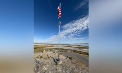 Flagpole installed illegally on Black Rock near Great Salt Lake, state agency mulls over removal