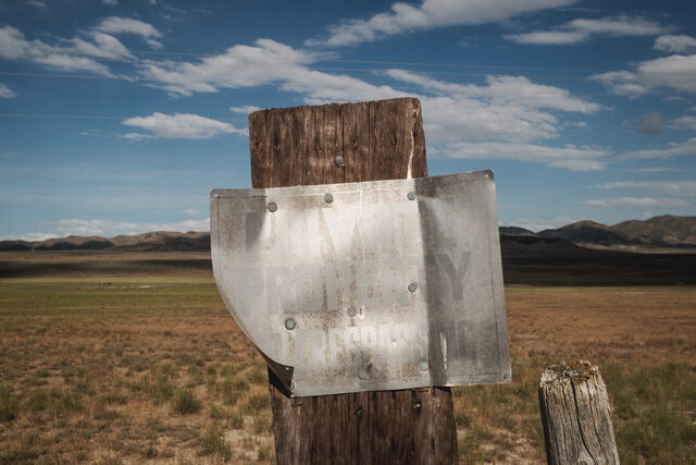 A weathered sign warns of private property boundaries in Hansel Valley, in Box Elder County, near the site of the proposed Stratos Project, a massive data center planned for 40,000 acres of land, on Wednesday, May 27, 2026. (Photo by Spenser Heaps for Utah News Dispatch)