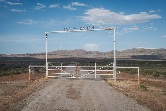 A gate blocks the entrance to part of Bar H Ranch, one of the largest land holders that has entered into an agreement with the proposed Stratos Project, a massive data center planned for 40,000 acres of land, in Hansel Valley, Box Elder County on Wednesday, May 27, 2026.(Photo by Spenser Heaps for Utah News Dispatch)