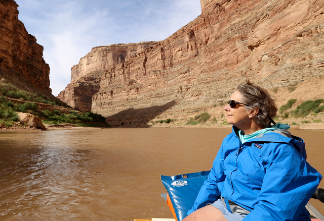 Anne Castle, U.S. commissioner for the Upper Colorado River Commission, takes in the scenery on a Returning Rapids trip in Cataract Canyon on the Colorado River on Saturday, Sept. 21, 2024.