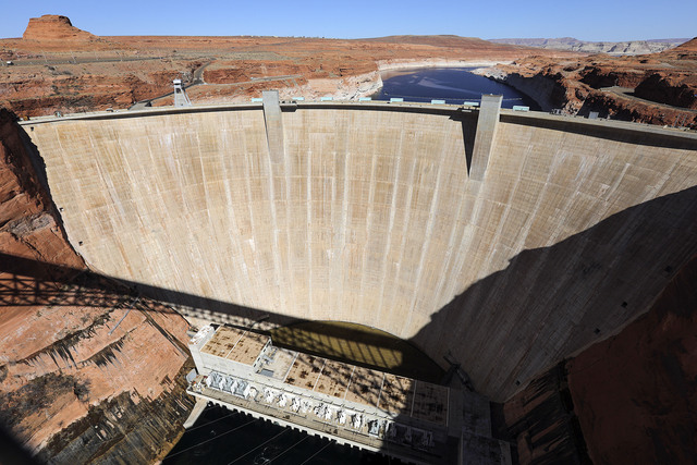 The Glen Canyon Dam is pictured in Page, Ariz., on Sunday, March 28, 2021.