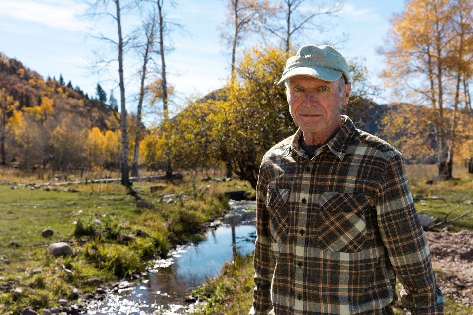 Steve Clyde stands by a flume, a humanmade channel for water, at his ranch in Kamas on Sunday, Oct. 15, 2023.