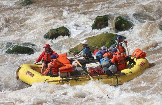 Peter Lefebvre, Returning Rapids researcher and OARS river guide, navigates Big Drop 3 in Cataract Canyon during a Returning Rapids trip on the Colorado River on Friday, Sept. 20, 2024. On board with him are Cory MacNulty, National Parks Conservation Association southwest region campaign director, Jennifer Pitt, National Audubon Society Colorado River Program director, Jack Schmidt, USU’s Janet Quinney Lawson Colorado River Studies chair and Center for Colorado River Studies director, and Paul Grams, USGS Southwest Biological Science Center research hydrologist.