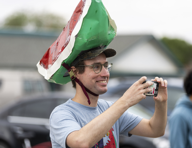 Kenny Fallon Jr. wears a watermelon hat while filming the the 118th annual Melon Days Festival parade in Green River on Saturday, Sept. 21, 2024.