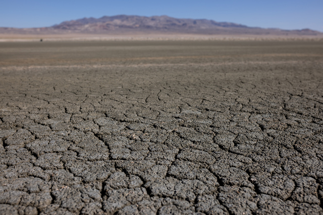 Cracked mud is seen on the dry lakebed of Owens Lake in Inyo County, California, on Wednesday, Aug. 10, 2022.