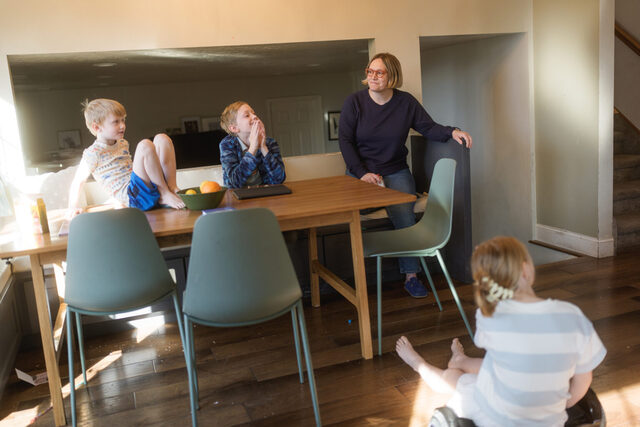 Adrienne Cardon and her children Graham, 5, Elliot, 12, and Claire, 9, hang out at their home in Orem on Saturday, Feb. 28, 2026. (Photo by Spenser Heaps for Utah News Dispatch)