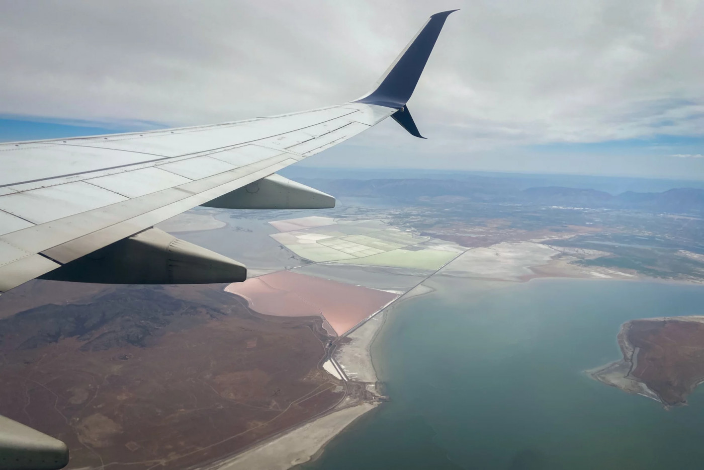 An aerial view of the southern tip of Promontory Point, the entrance to Bear River Bay and the northern edge of Fremont Island in the Great Salt Lake, June 20, 2024. (Ciara Hulet/KUER) 