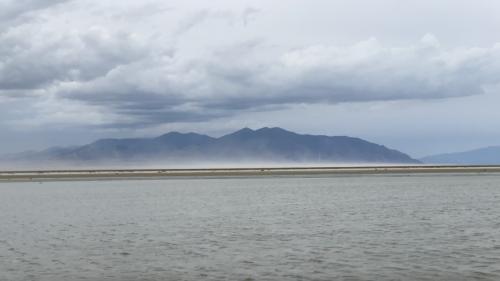 A dust storm blows off the exposed lake bed of the Great Salt Lake at Farmington Bay and into Salt Lake City on August 19, 2022. (Ben Winslow/Fox 13)