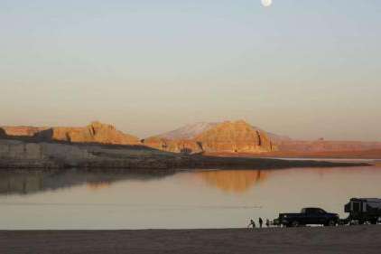 People camp on Lone Rock Beach in the Glen Canyon National Recreation Area at Lake Powell in Utah on March 27, 2021. (Kristin Murphy/Deseret News)