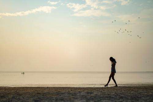 (Rick Egan | The Salt Lake Tribune) Dibora Sahile wades in the Great Salt Lake, on Thursday, Aug. 8, 2024.