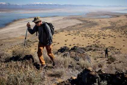 Jason Curry, then-deputy director of the Utah Division of Forestry, Fire and State Lands, hikes on Fremont Island while giving journalists a tour on Oct. 21, 2021. Fremont Island could become a potential reintroduction site for bighorn sheep. Jason Curry, then-deputy director of the Utah Division of Forestry, Fire and State Lands, hikes on Fremont Island while giving journalists a tour on Oct. 21, 2021. Fremont Island could become a potential reintroduction site for bighorn sheep. (Spenser Heaps, Deseret News) 