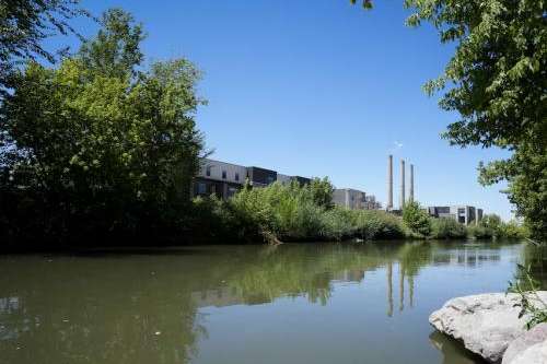 (Bethany Baker | The Salt Lake Tribune) The Gadsby Plant is seen along with a town house complex beside the Jordan River in Salt Lake City on Friday, July 25, 2025.