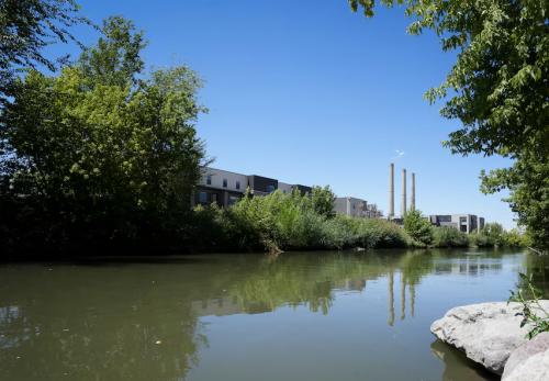 (Bethany Baker | The Salt Lake Tribune) The Gadsby Plant is seen along with a town house complex beside the Jordan River in Salt Lake City on Friday, July 25, 2025.