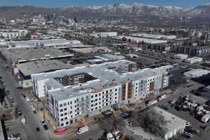 A luxury apartment building called the Whitney is under construction in Salt Lake City on Jan. 28. Salt Lake City is a step closer to matching a new state law requiring cities to plan for water needs in city plans. (Kristin Murphy, Deseret News)