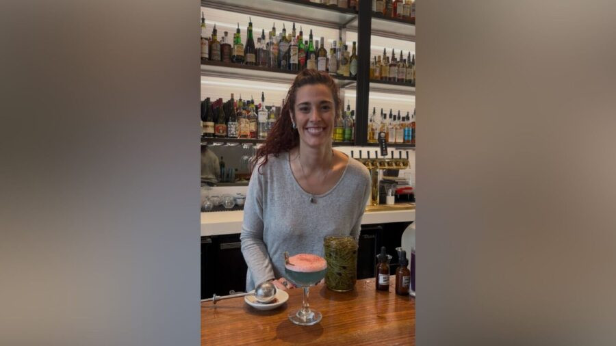 Post Office Place Bartender April Long poses with "What Remains," a Great Salt Lake-inspired cocktail she created for this year's Salt Lake Magazine Farm-to-Glass Cocktail Content. (Mariah Maynes/Great Salt Lake Collaborative)