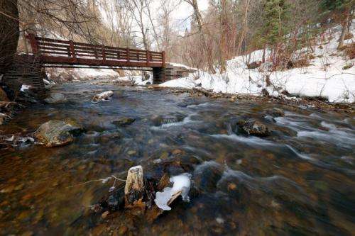 Water runs out of Tibble Fork Reservoir in American Fork Canyon on Tuesday, Feb. 1, 2022.