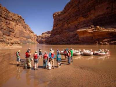 A group of rafters is briefed before running the San Juan River, a tributary of the Colorado River, location and date not specified.  Photo courtesy of Noah Wetzel