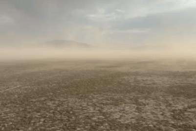 (Kevin Perry) Dust blows off the drying playa of Farmington Bay with Antelope Island in the background on July 9, 2025.