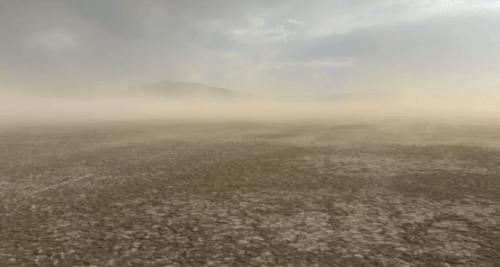 (Kevin Perry) Dust blows off the drying playa of Farmington Bay with Antelope Island in the background on July 9, 2025.