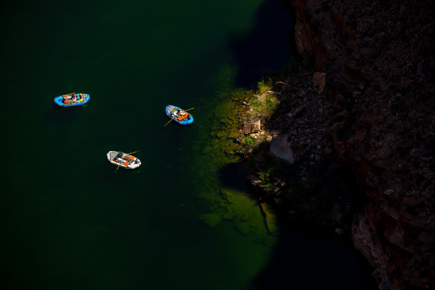 (Trent Nelson | The Salt Lake Tribune) Rafts on the Colorado River as seen from Navajo Bridge in Ariz. on Tuesday, May 20, 2025.