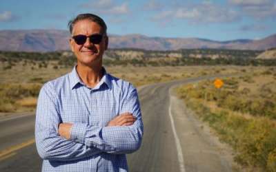 (David Condos | KUER) Price Mayor Michael Kourianos stands in front of the proposed site for a new reservoir that would benefit local city and farm water supplies, Oct. 1, 2025.