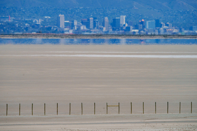 (Trent Nelson | The Salt Lake Tribune) The shore of the Great Salt Lake, with Salt Lake City in the distance, as seen from Antelope Island on Thursday, May 1, 2025.