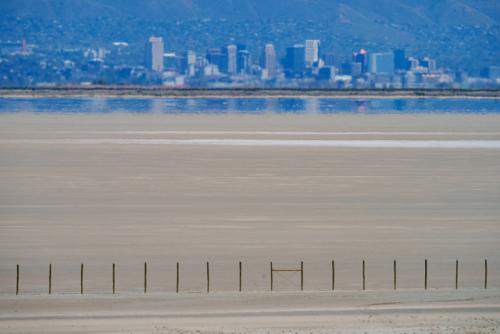 (Trent Nelson | The Salt Lake Tribune) The shore of the Great Salt Lake, with Salt Lake City in the distance, as seen from Antelope Island on Thursday, May 1, 2025.