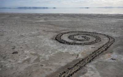(Leah Hogsten | The Salt Lake Tribune) People explore the Spiral Jetty, just south of the Rozel Point peninsula on the northeastern shore, March 25, 2022.