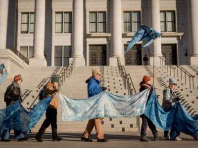  Members of the Making Waves Artist Collaborative takes part in a demonstration to bring awareness to the plight of the Great Salt Lake at the Capitol in Salt Lake City on the first day of the legislative session, Tuesday, Jan. 20, 2026. (Photo by Spenser Heaps for Utah News Dispatch)