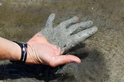 Gia Ly, of Salt Lake City, feels the water, sand and brine shrimp at the Great Salt Lake on June 18, 2012. A trio of Great Salt Lake-related bills passed through a House of Representatives committee with glowing reviews.  Gia Ly, of Salt Lake City, feels the water, sand and brine shrimp at the Great Salt Lake on June 18, 2012. A trio of Great Salt Lake-related bills passed through a House of Representatives committee with glowing reviews. (Ravell Call, Deseret News) 