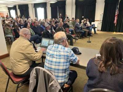 Photo by Jeff Richards, St. George News / Cedar City News A crowd estimated to be at least 350 people fills the upper rooms of the Heritage Center for an Iron County Planning Commission meeting featuring a public hearing on a proposed data center, Cedar City, Utah, March 5, 2026. 
