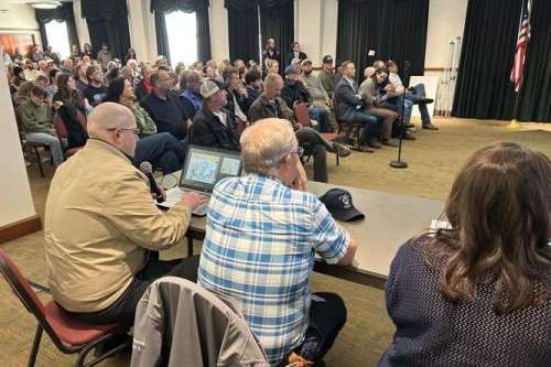Photo by Jeff Richards, St. George News / Cedar City News A crowd estimated to be at least 350 people fills the upper rooms of the Heritage Center for an Iron County Planning Commission meeting featuring a public hearing on a proposed data center, Cedar City, Utah, March 5, 2026. 
