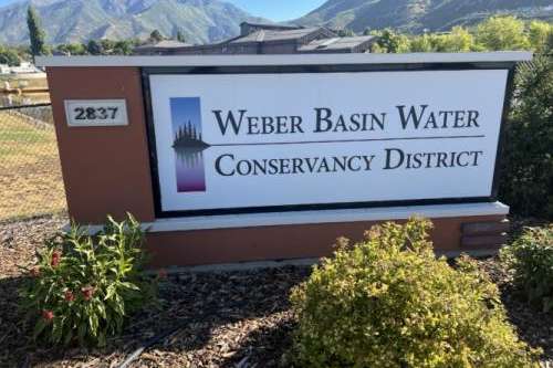 A Weber Basin Water Conservancy District sign is pictured Thursday, Aug. 22, 2024. (Ryan Aston, Standard-Examiner file photo)