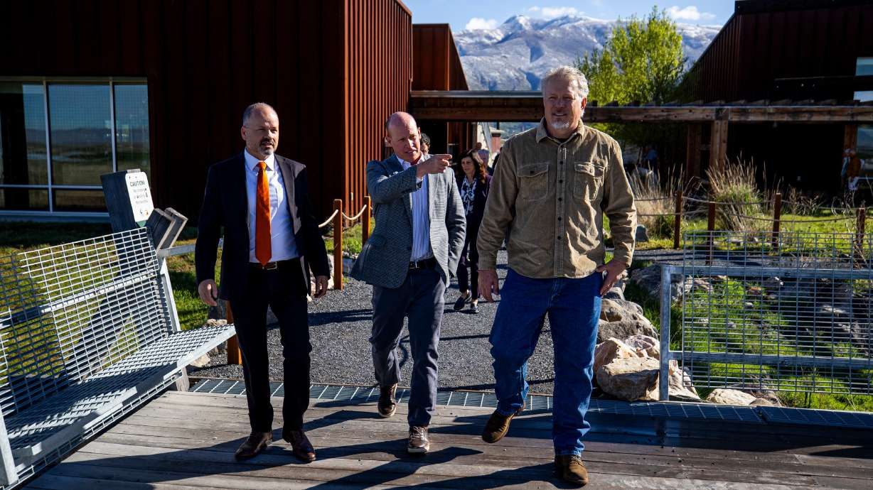 Joel Ferry points toward the Great Salt Lake as he walks with Timothy Hawkes and Greg Miller to the observation deck at the Eccles Wildlife Education Center in Farmington on Monday. Joel Ferry points toward the Great Salt Lake as he walks with Timothy Hawkes and Greg Miller to the observation deck at the Eccles Wildlife Education Center in Farmington on Monday. (Rio Giancarlo, Deseret News)