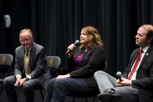 (Bethany Baker | The Salt Lake Tribune) Senate District 7 Republican primary candidate Stephanie Hollist, center, answers questions alongside Senate President J. Stuart Adams, R-Layton, left, and Republican candidate Braden Hess during a Grow the Flow forum in Sunset on Tuesday, June 16, 2026.