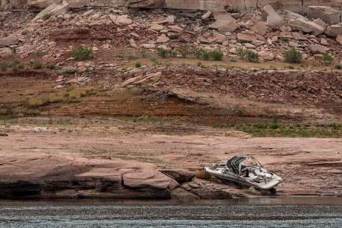 (Francisco Kjolseth | The Salt Lake Tribune) An abandoned boat is pictured on Lake Powell on Saturday, April 25, 2026.
