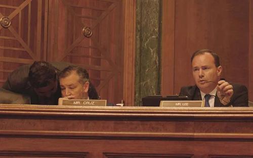 In this July 2022 file photo, Republican Sen. Mike Lee of Utah, right, grills Arizona attorney Roopali Desai on her previous advocacy during a hearing on her nomination to a seat on the 9th U.S. Circuit Court of Appeals. At left is Sen. Ted Cruz, R-Texas. (Photo by Morgan Fischer/Cronkite News)