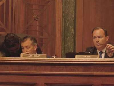 In this July 2022 file photo, Republican Sen. Mike Lee of Utah, right, grills Arizona attorney Roopali Desai on her previous advocacy during a hearing on her nomination to a seat on the 9th U.S. Circuit Court of Appeals. At left is Sen. Ted Cruz, R-Texas. (Photo by Morgan Fischer/Cronkite News)