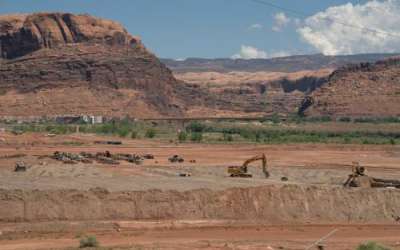 (Trevor Christensen | The Salt Lake Tribune) Construction equipment gathers radioactive mill tailings at the Utah Moab Uranium Mill Tailings Remedial Action (UMTRA) Project on Wednesday, Aug. 14, 2024. The 480-acre site was once the home of a uranium mill that processed 1,400 tons of uranium ore per day. (Trevor Christensen | The Salt Lake Tribune) Construction equipment gathers radioactive mill tailings at the Utah Moab Uranium Mill Tailings Remedial Action (UMTRA) Project on Wednesday, Aug. 14, 2024. The 480-acre site was once the home of a uranium mill that processed 1,400 tons of uranium ore per day.