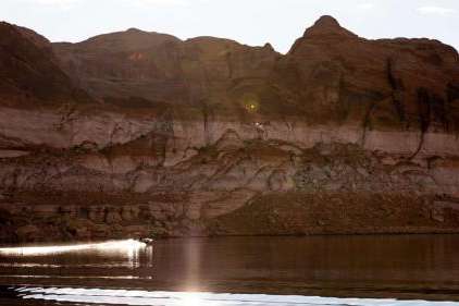 A boat seen against the backdrop of Lake Powell&rsquo;s &ldquo;bathtub ring,&rdquo; a light-colored coating of mineral deposits left on the canyon walls on Oct. 7, 2022 near Bullfrog. The federal government on Friday released a new management plan for it and Lake Mead. A boat seen against the backdrop of Lake Powell&rsquo;s &ldquo;bathtub ring,&rdquo; a light-colored coating of mineral deposits left on the canyon walls on Oct. 7, 2022 near Bullfrog. The federal government on Friday released a new management plan for it and Lake Mead. (Spenser Heaps, Deseret News)