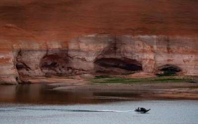 (Francisco Kjolseth | The Salt Lake Tribune) A boat makes its way to Bullfrog Marina on Lake Powell as high water marks indicate how much the reservoir has receded on Friday, April 24, 2026. (Francisco Kjolseth | The Salt Lake Tribune) A boat makes its way to Bullfrog Marina on Lake Powell as high water marks indicate how much the reservoir has receded on Friday, April 24, 2026.