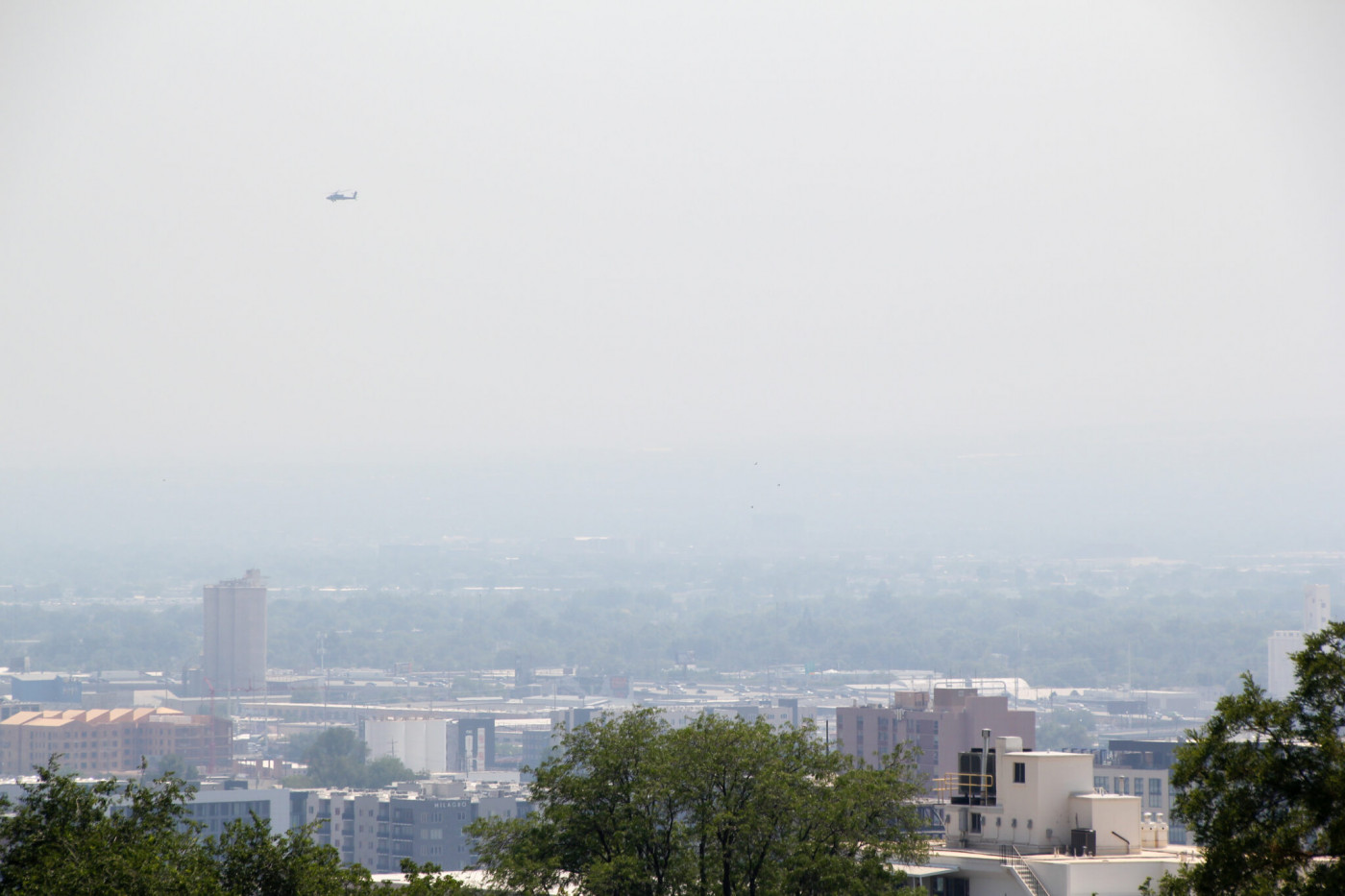 Wildfire smoke obscures the view of Salt Lake City from the Utah Capitol on June 23, 2026. (McKenzie Romero/Utah News Dispatch)