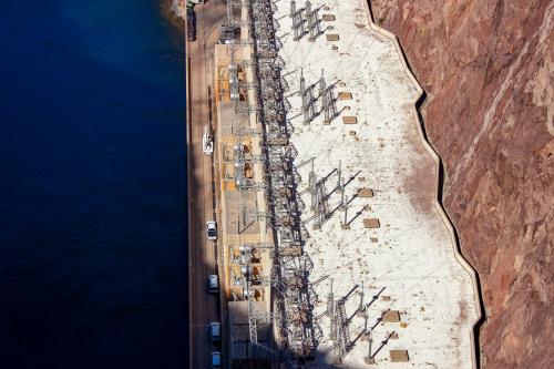 (Brett Walton | Circle of Blue) Morning sun strikes the powerhouse on the Nevada side of Hoover Dam.