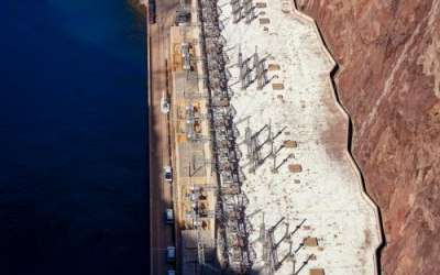 (Brett Walton | Circle of Blue) Morning sun strikes the powerhouse on the Nevada side of Hoover Dam. (Brett Walton | Circle of Blue) Morning sun strikes the powerhouse on the Nevada side of Hoover Dam.