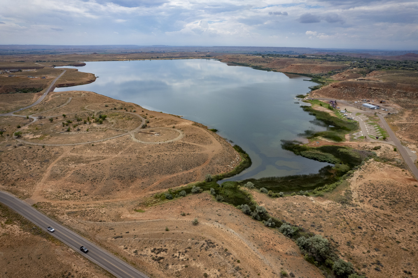 (Rick Egan | The Salt Lake Tribune) Bottle Hollow Reservoir on the Uintah and Ouray Reservation on Thursday, Aug. 13, 2026. The Bureau of Reclamation built the reservoir to offset the effects of the Central Utah Project, but the reservoir has suffered from water quality issues. 