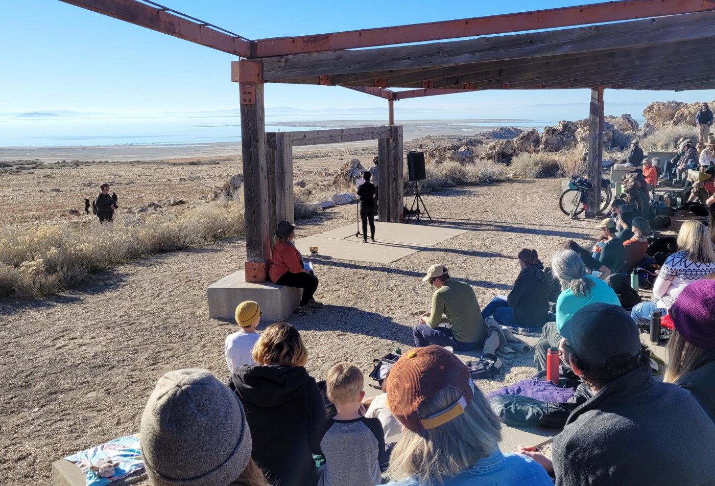 Participants read parts of a praise poem to Great Salt Lake near the Antelope Island visitor center. | Aimee Van Tatenhove
